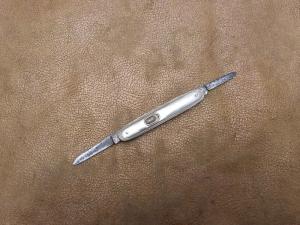 Challenge cutlery 3 3/8" silver switchblade 