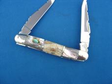 Case XX Sectioned Handle Abalone Pearl & Mammoth Tooth Filed Worked Muskrat Knife Case XX Sectioned Handle Abalone Pearl & Mammoth Tooth Filed Worked Muskrat Knife