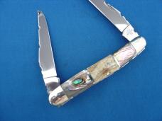 Case XX Sectioned Handle Abalone Pearl & Mammoth Tooth Filed Worked Muskrat Knife Case XX Sectioned Handle Abalone Pearl & Mammoth Tooth Filed Worked Muskrat Knife