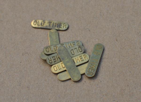 Schrade Auction USA Made Brass Old Timer Shield 3/4" NOS Smooth Reverse One Shield One Dollar