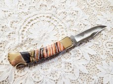 Custom Buck 110 with Mammoth  scales!!