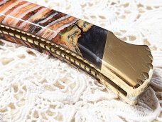 Custom Buck 110 with Mammoth  scales!!