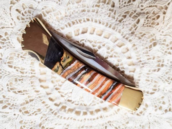 Custom Buck 110 with Mammoth  scales!!