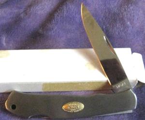 SOLD ..MOKI folder with Stainless Scales