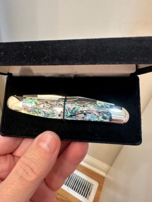 Case XX Silver Script Muskrat w/ Abalone handles. Mint!