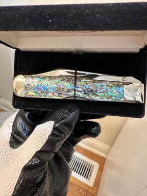 Case XX Cheetah w/ Paua handles & Case Collector Club shield. #31 of 100 made w/COA. Absolute Mint!
