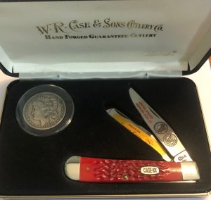 New in display Case Trapper and 1890 Silver Morgan Dollar