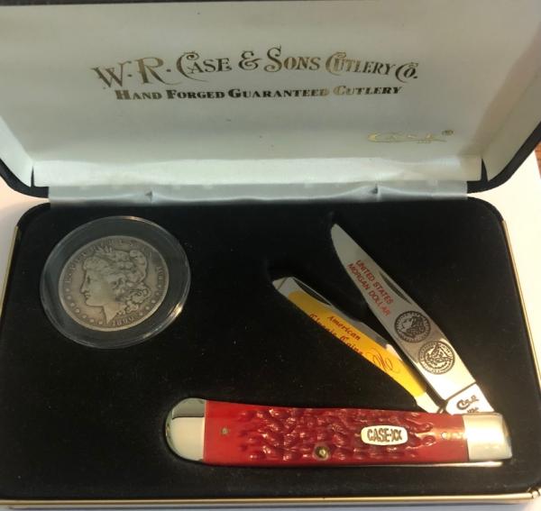 New in display Case Trapper and 1890 Silver Morgan Dollar New in display Case Trapper and 1890 Silver Morgan Dollar
