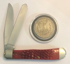 New in display Case Trapper and 1890 Silver Morgan Dollar New in display Case Trapper and 1890 Silver Morgan Dollar