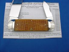 Case XX Classic Sunfish/Toenail Genuine Light Tan Rogers Bone Knife With Dualing Elephants Case XX Classic Sunfish/Toenail Genuine Light Tan Rogers Bone Knife With Dualing Elephants