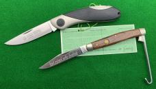 Two PUMA Folding Knives with Box and Paperwork. Two PUMA Folding Knives with Box and Paperwork.