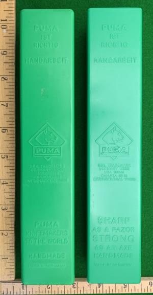  Two Empty PUMA Green and Yellow Plastic Knife Boxes and one Puma Sheath. All in Great condition. ..