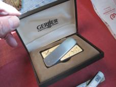 NEW GERBER TOUCHE Belt Buckle Knife w/ box Scrimshaw Duck NEW GERBER TOUCHE Belt Buckle Knife w/ box Scrimshaw Duck