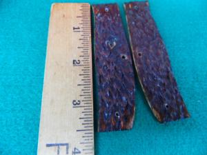 TWO PIECES OF JIGGED BROWN BONE SCALES 3-1/2" USED FOUND IN BAG OF PARTS