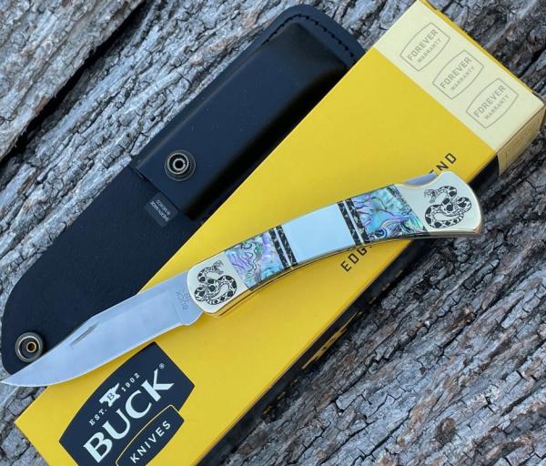 BUCK 110 ** BRIAN YELLOWHORSE CUSTOM RATTLESNAKE MOTHER OF PEARL/ABALONE BRASS BOLSTERS