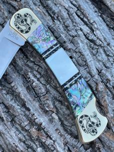 BUCK 110 ** BRIAN YELLOWHORSE CUSTOM RATTLESNAKE MOTHER OF PEARL/ABALONE BRASS BOLSTERS