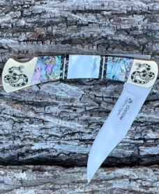 BUCK 110 ** BRIAN YELLOWHORSE CUSTOM RATTLESNAKE MOTHER OF PEARL/ABALONE BRASS BOLSTERS