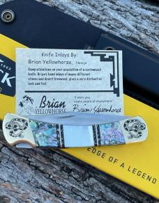 BUCK 110 ** BRIAN YELLOWHORSE CUSTOM RATTLESNAKE MOTHER OF PEARL/ABALONE BRASS BOLSTERS