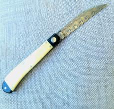 K'roo Slimline Wharnie"...4"...Black Linen bolsters&caps..Warthog Tusk Ivory Scales....Damasteel K'roo Slimline Wharnie"...4"...Black Linen bolsters&caps..Warthog Tusk Ivory Scales....Damasteel
