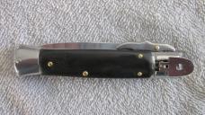 8" SLS auto Knife -(Swinguard Leverlock Stiletto) switchblade knife. Ebony wood handles. 8" SLS auto Knife -(Swinguard Leverlock Stiletto) switchblade knife. Ebony wood handles.