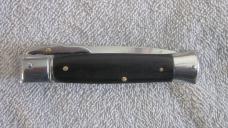 8" SLS auto Knife -(Swinguard Leverlock Stiletto) switchblade knife. Ebony wood handles. 8" SLS auto Knife -(Swinguard Leverlock Stiletto) switchblade knife. Ebony wood handles.