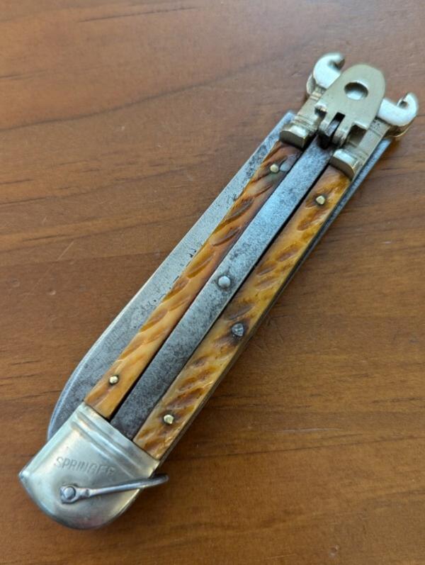 JAPANESE MADE AMBER PICKBONE EXTRACTOR SWITCHBLADE JAPANESE MADE AMBER PICKBONE EXTRACTOR SWITCHBLADE