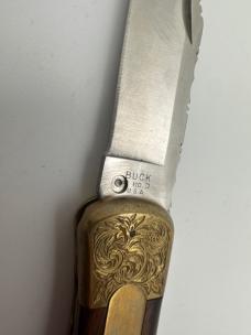 2000 Buck 110 Lock back Automatic Switchblade Engraved Bolsters Excellent 2000 Buck 110 Lock back Automatic Switchblade Engraved Bolsters Excellent