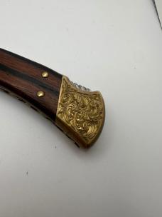2000 Buck 110 Lock back Automatic Switchblade Engraved Bolsters Excellent 2000 Buck 110 Lock back Automatic Switchblade Engraved Bolsters Excellent