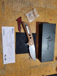 REATE PL-XF. Drop Point Blade. Tan G10 Handle. Quality crafted knife. Good weight very smoot REATE PL-XF. Drop Point Blade. Tan G10 Handle. Quality crafted knife. Good weight very smoot