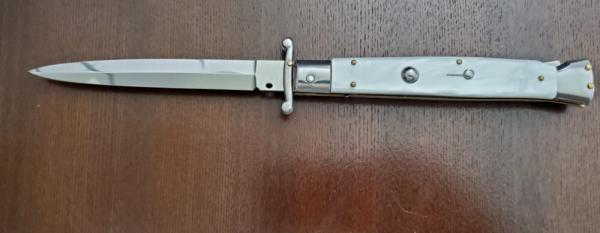 Frank B Swing Guard 11" Pearlex scales. Frank B Swing Guard 11" Pearlex scales.
