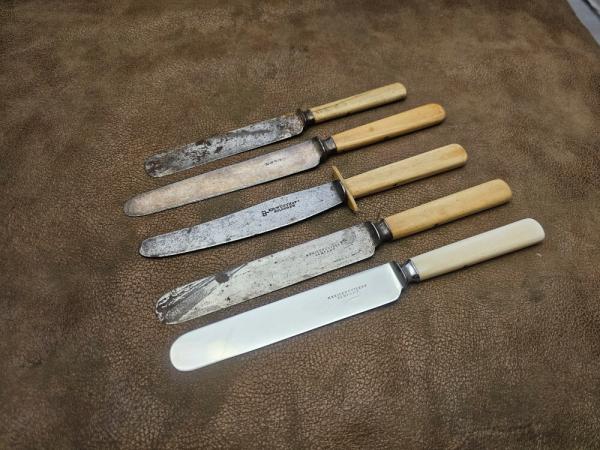 Lot of civil war era ivory handled table knives Lot of civil war era ivory handled table knives