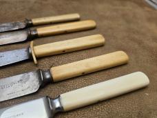 Lot of civil war era ivory handled table knives Lot of civil war era ivory handled table knives