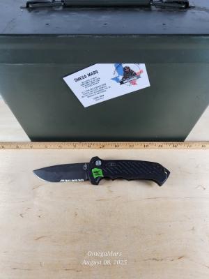 Gerber 06 Auto Drop point Serrated #1A Light usage