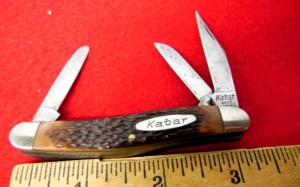 KABAR 1081 JIGGED DELRIN STOCKMAN FROM STORAGE PRE OWNED 3-1/4" JOB READY