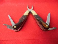 HUSKY 4" MULTI-TOOL WOOD SCALES NEVER USED YEAR UNKNOWN 8 TOOLS HUSKY 4" MULTI-TOOL WOOD SCALES NEVER USED YEAR UNKNOWN 8 TOOLS