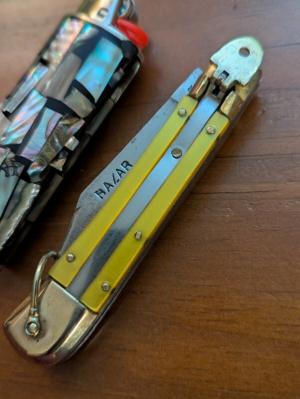 1970'S JAPANESE LEVERLOCK IN AMBER COLORED LUCITE BOUGHT IN THE PHILIPPINES DURING VIETNAM CONFLICT 