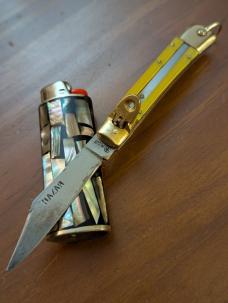 1970'S JAPANESE LEVERLOCK IN AMBER COLORED LUCITE BOUGHT IN THE PHILIPPINES DURING VIETNAM CONFLICT 1970'S JAPANESE LEVERLOCK IN AMBER COLORED LUCITE BOUGHT IN THE PHILIPPINES DURING VIETNAM CONFLICT