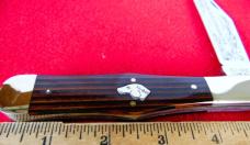 KABAR 1983 DOG HEAD COKE BOTTLE BROWN STRIPE CLUB KNIFE 5-1/4" UNUSED FROM STORAGE WELL CARED FOR KABAR 1983 DOG HEAD COKE BOTTLE BROWN STRIPE CLUB KNIFE 5-1/4" UNUSED FROM STORAGE WELL CARED FOR
