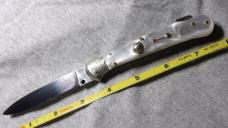 1960's vintage peal scaled bird beak knife . this item is sold 1960's vintage peal scaled bird beak knife . this item is sold