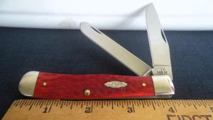 CASE XX 5 DOT JIGGED RED BONE TRAPPER WITH CARBON BLADES & POCKET CLIP UNUSED