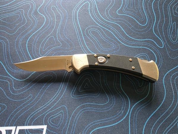 Buck 112+ Ranger Auto Elite -- Automatic Lockback Knife Black G-10 Buck 112+ Ranger Auto Elite -- Automatic Lockback Knife Black G-10