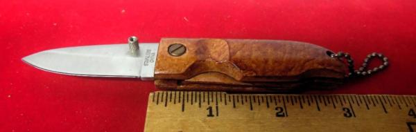 KEY CHAIN HARDWOOD SCALES AND GOOD EDGE IMPORTED LINERLOCK 3-1/4" WELL CARED FOR KEY CHAIN HARDWOOD SCALES AND GOOD EDGE IMPORTED LINERLOCK 3-1/4" WELL CARED FOR