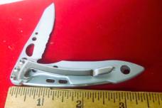 STAINLESS LEATHERMAN SKELETOOL KBx PART SERRATED PRE OWNED FROM STORAGE VERY NICE STAINLESS LEATHERMAN SKELETOOL KBx PART SERRATED PRE OWNED FROM STORAGE VERY NICE