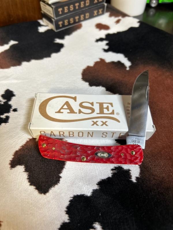 Case dark red bone peach seed sod buster jr