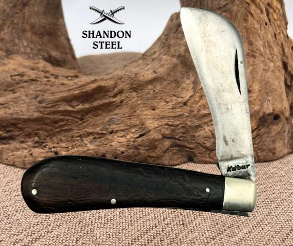 KA-BAR USA Vintage Hawkbill Folding Pocket Knife Carbon Steel Wood Handle (79) KA-BAR USA Vintage Hawkbill Folding Pocket Knife Carbon Steel Wood Handle (79)