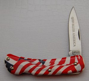 Camillus In Near Mint Condition With Synthetic Flag Covers 3 1/4