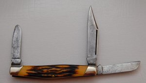 Camillus In Excellent Condition With Burnt Bone Synthetic Covers 3 7/8