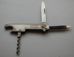 Landers, Frary and Clark Bartenders Knife In Near Mint Condition With Metal Covers 2 7/8" Long (371)
