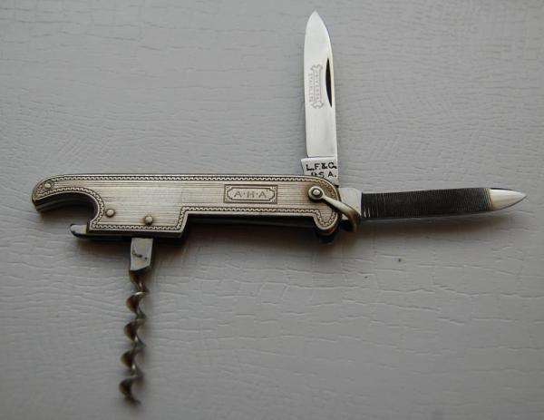 Landers, Frary and Clark Bartenders Knife In Near Mint Condition With Metal Covers 2 7/8" Long (371) Landers, Frary and Clark Bartenders Knife In Near Mint Condition With Metal Covers 2 7/8" Long (371)