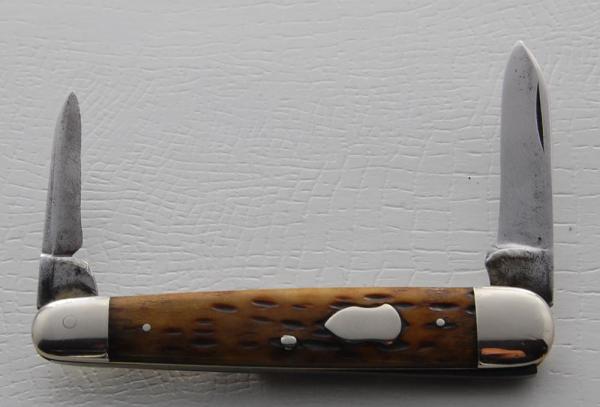 Cattaraugus In Very Good Condition With Brown Jigged Bone Covers 3 5/16